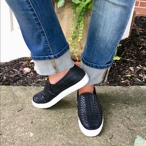 Black woven slip on sneaker
